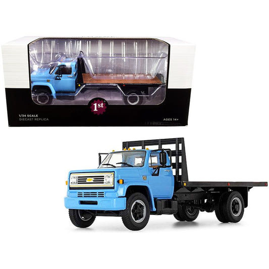 Chevrolet C65 Flatbed Truck Blue and Black 1/34 Diecast Model by First Gear