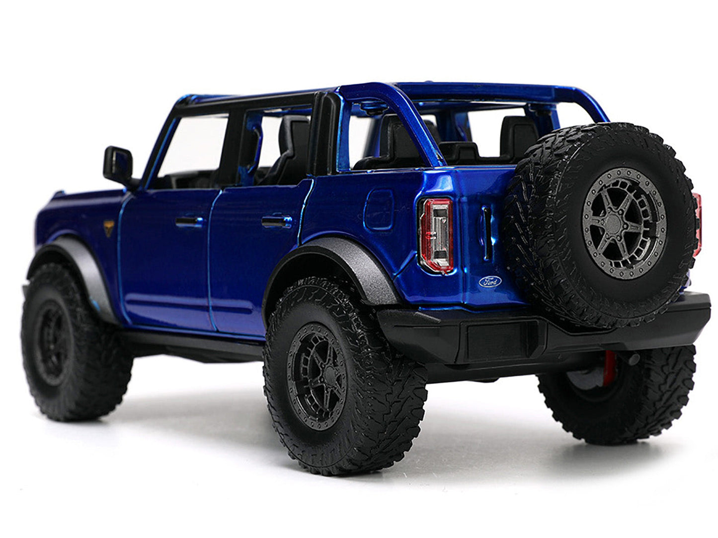 2021 Ford Bronco Open-Top Candy Blue Metallic with Extra Wheels "Just Trucks" Series 1/24 Diecast Model Car by Jada