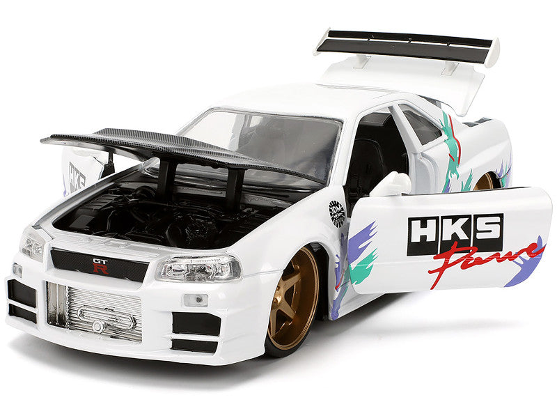 2002 Nissan Skyline GT-R (R34) RHD (Right Hand Drive) "HKS Power" White with Carbon Hood and Graphics "JDM Tuners" Series 1/24 Diecast Model Car by Jada