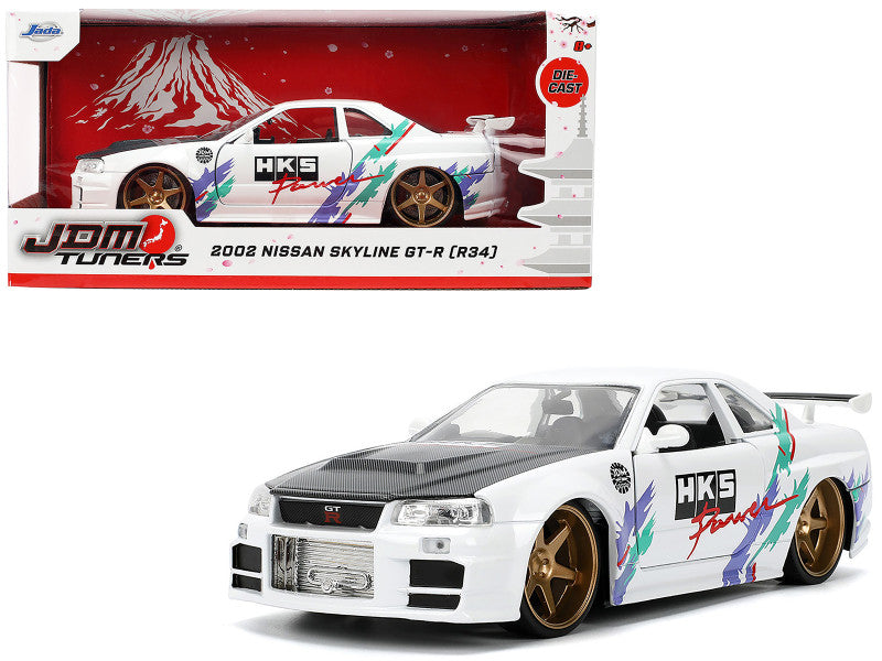 2002 Nissan Skyline GT-R (R34) RHD (Right Hand Drive) "HKS Power" White with Carbon Hood and Graphics "JDM Tuners" Series 1/24 Diecast Model Car by Jada