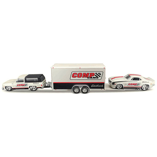 1979 Chevrolet K5 Blazer White and Black and 1968 Chevrolet Camaro Z/28 White with Stripes with Enclosed Car Trailer "Comp Cams - Edlebrock" "Team Haulers" Series 1/64 Diecast Model Car by Maisto