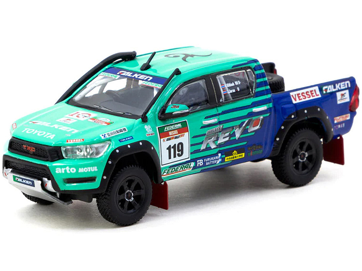 2017 Toyota Hilux AXCR Pickup Truck RHD (Right Hand Drive) #119 Green and Blue "Falken" Livery with Plastic Transporter Packaging "Falken Tires" 1/64 Diecast Model Car by Tarmac Works